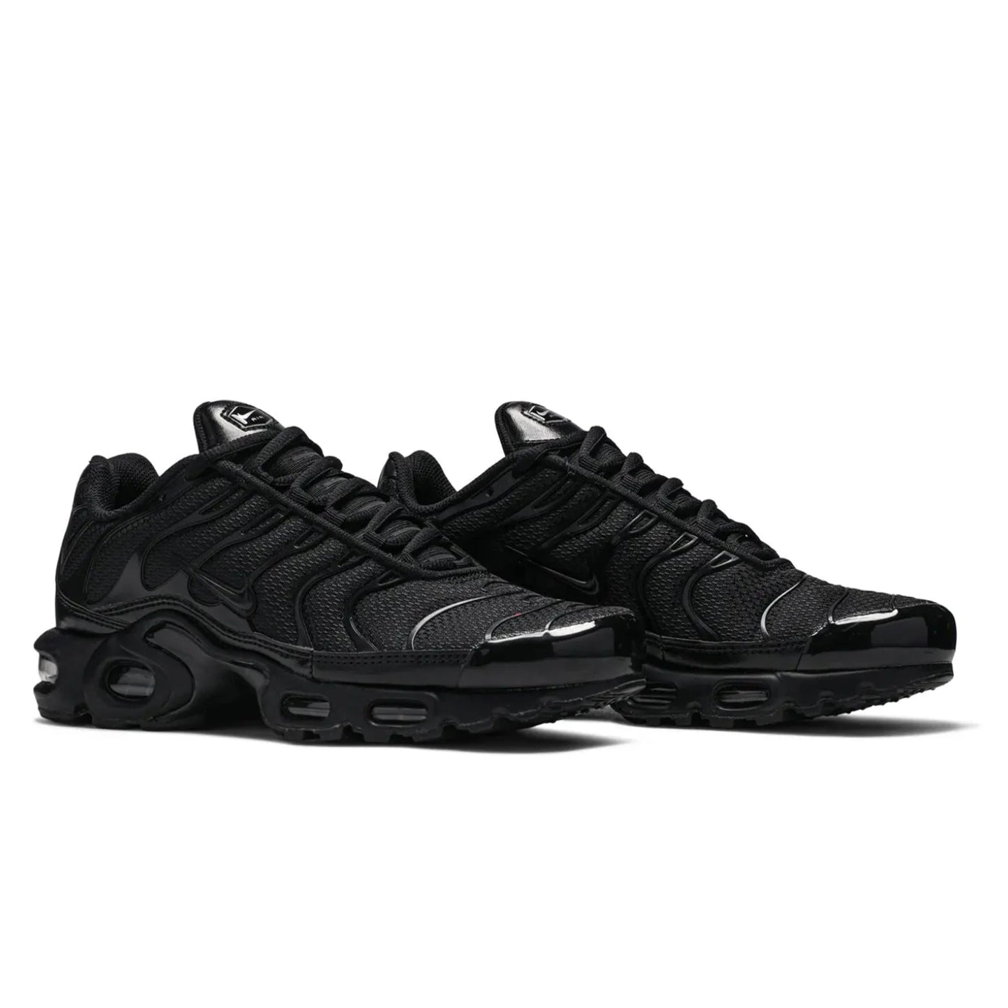 Pair of black sneakers on a white background