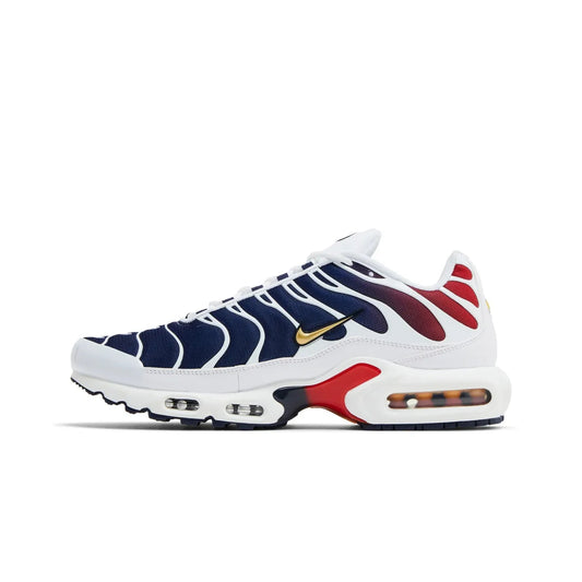 White sneaker with blue and red accents on a white background