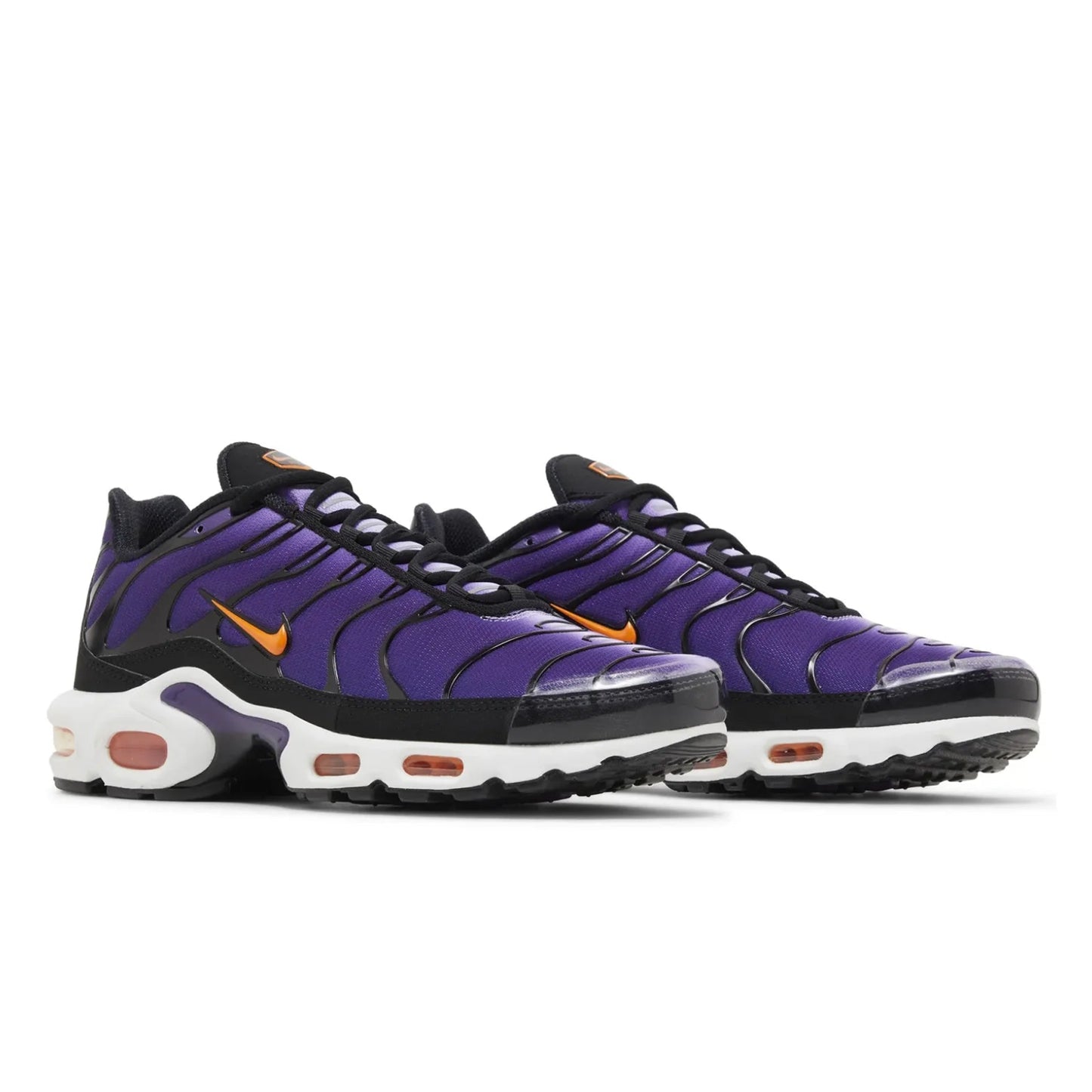 Purple and black sneakers with orange accents on a white background
