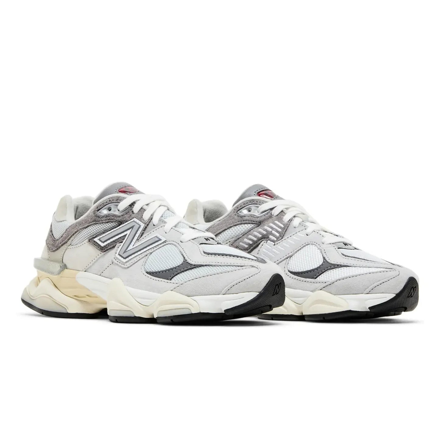 Pair of white and gray sneakers on a white background