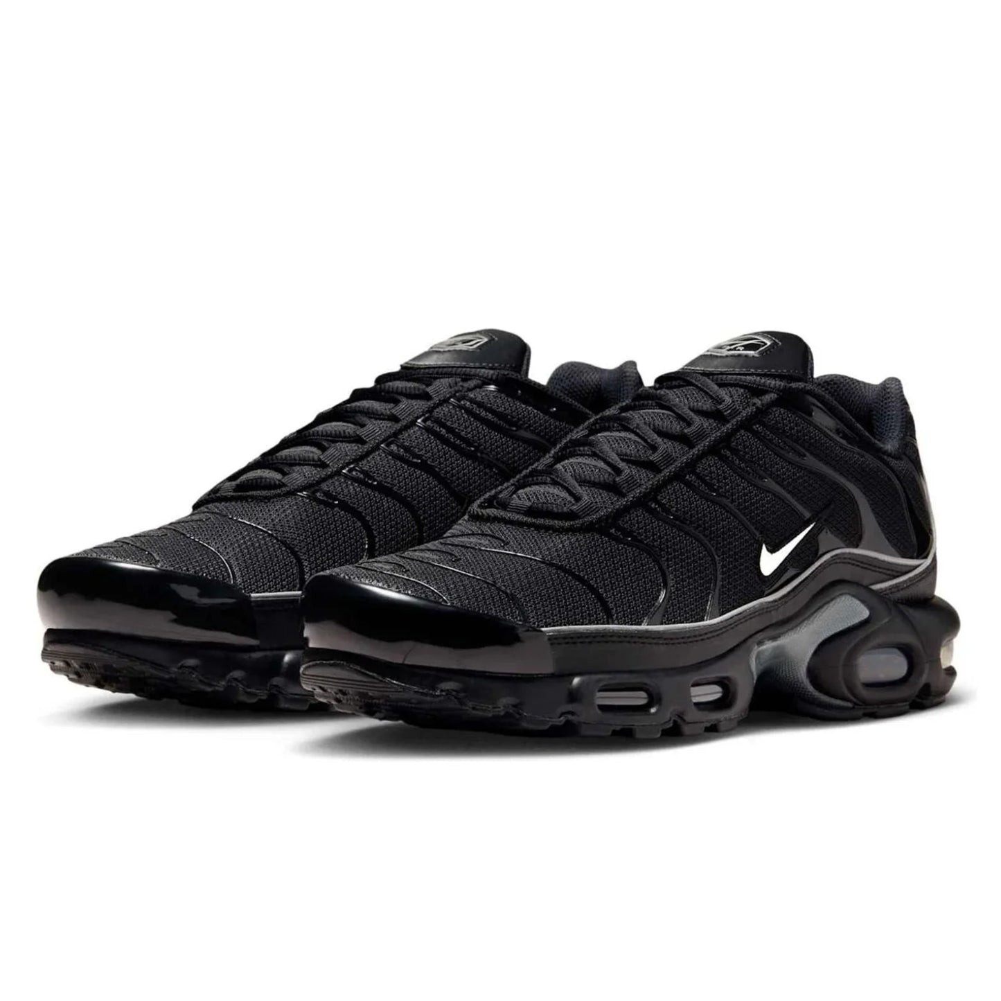 Black Nike sneakers on a white background