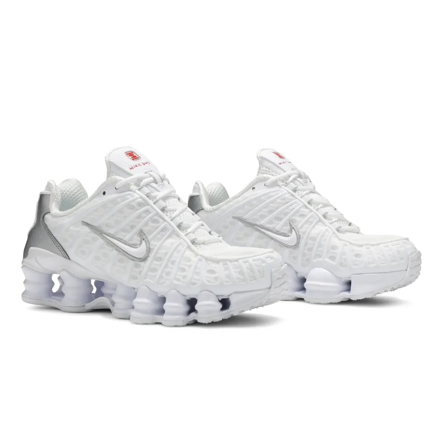 White sneakers with a Nike logo on a white background