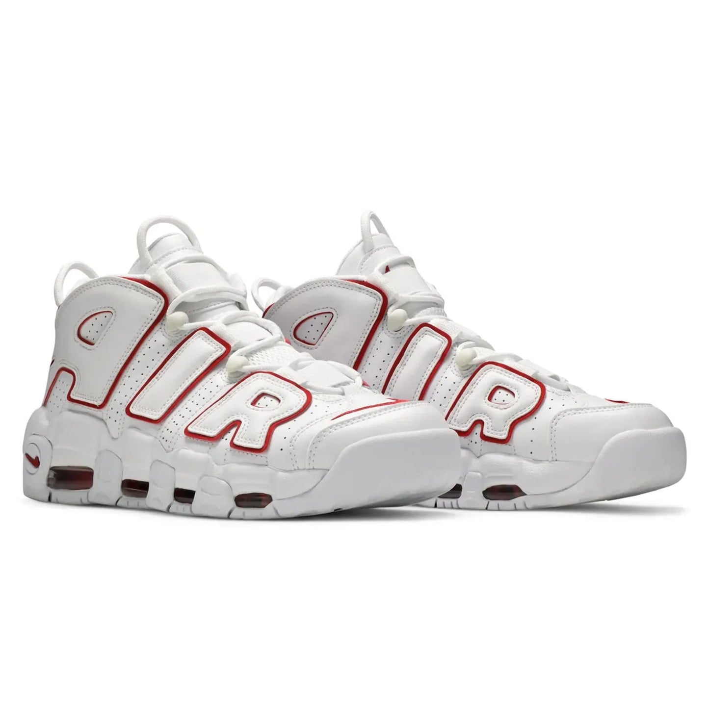 White sneakers with red accents on a white background