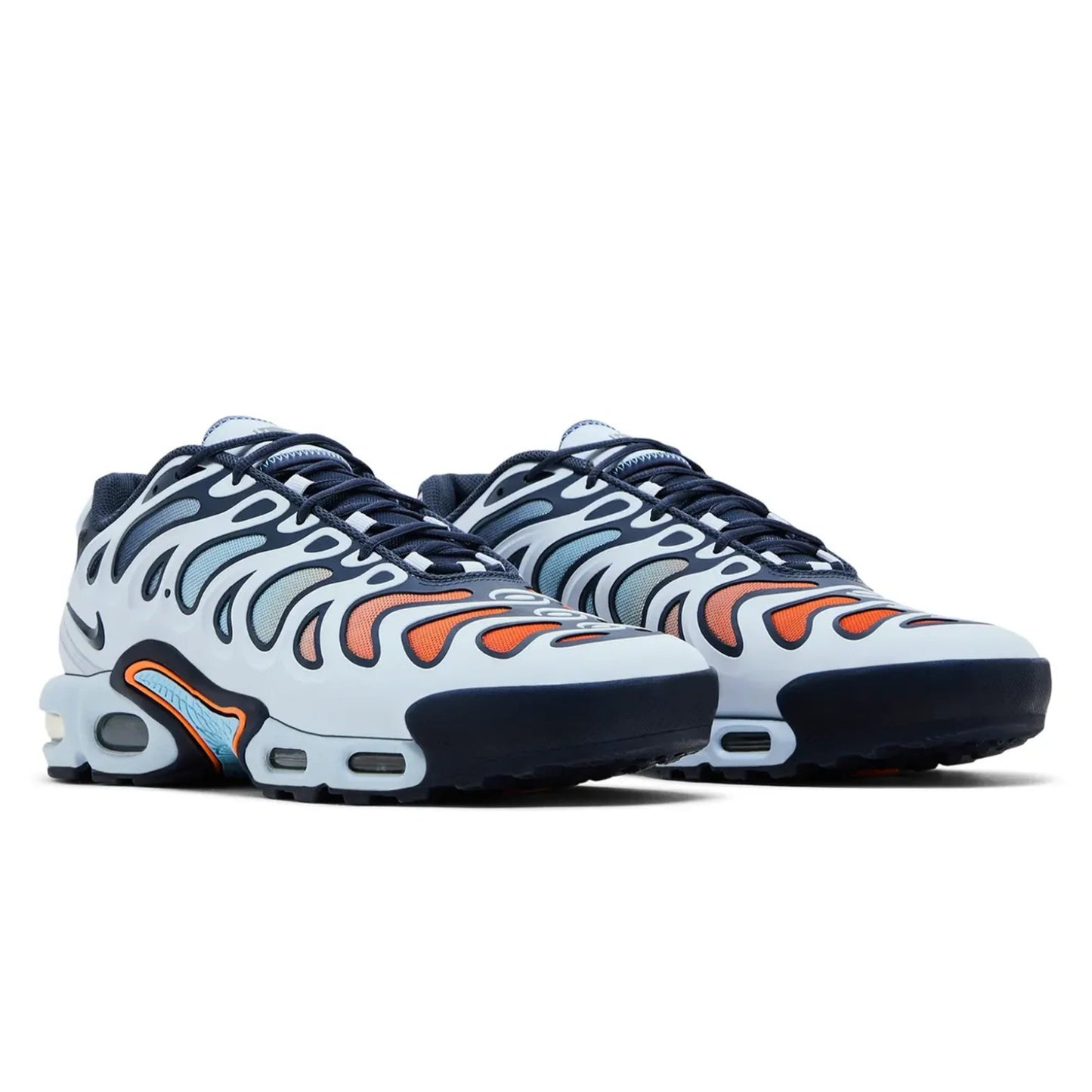 Pair of Nike Air Max Plus sneakers with white, orange, and black design on a white background