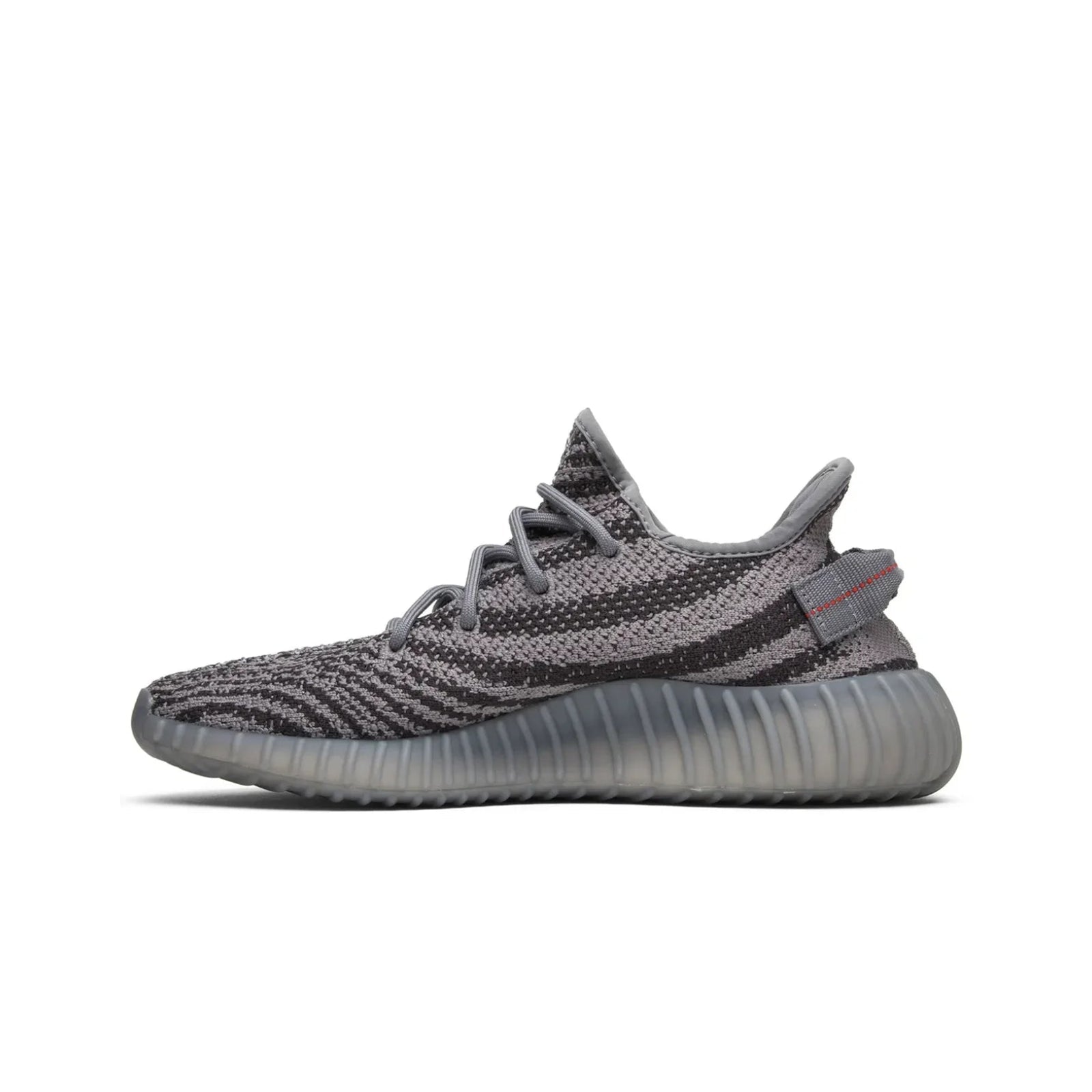 Gray sneaker with black accents on a white background