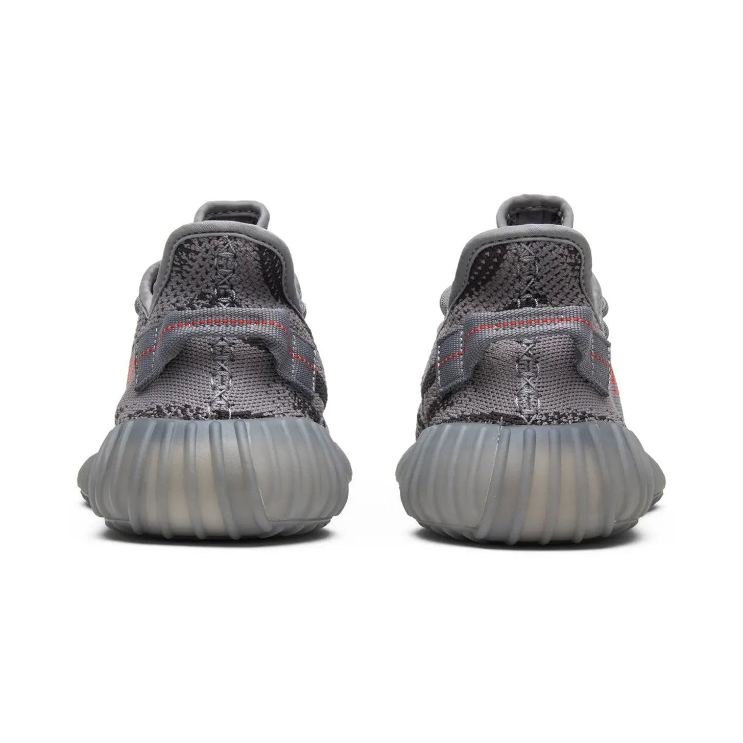 Gray sneakers with a textured sole on a white background