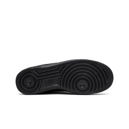 Black sole of a sneaker on a white background