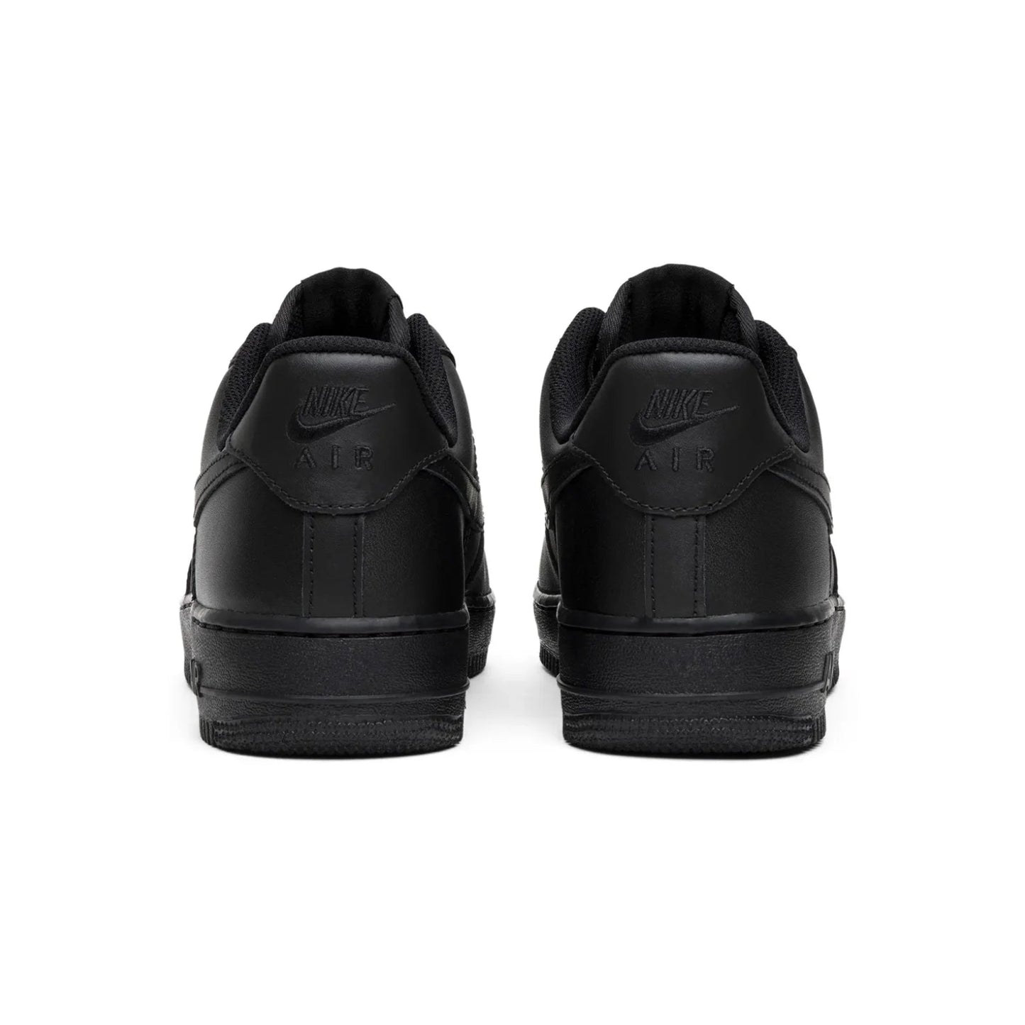 Black Nike sneakers shown from the back on a white background