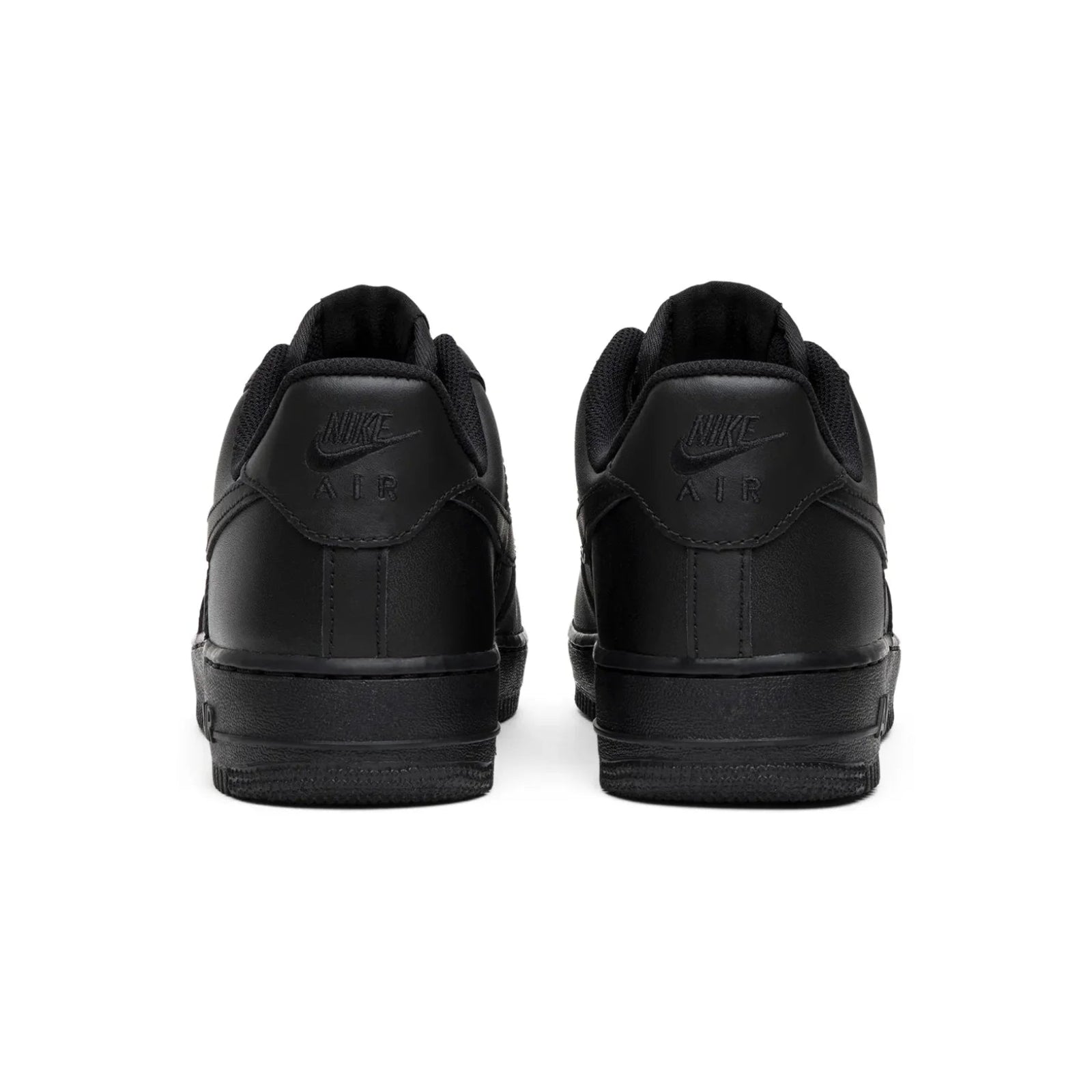 Black Nike sneakers shown from the back on a white background