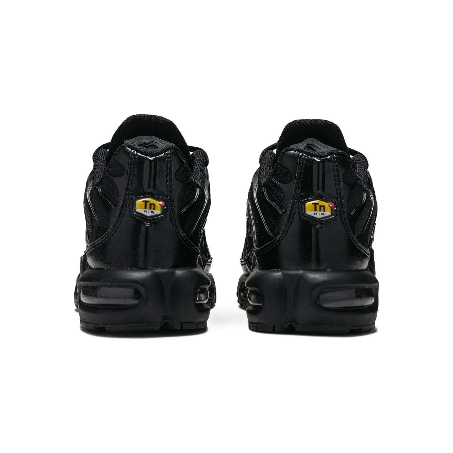 Black sneakers with a brand logo on the back on a white background