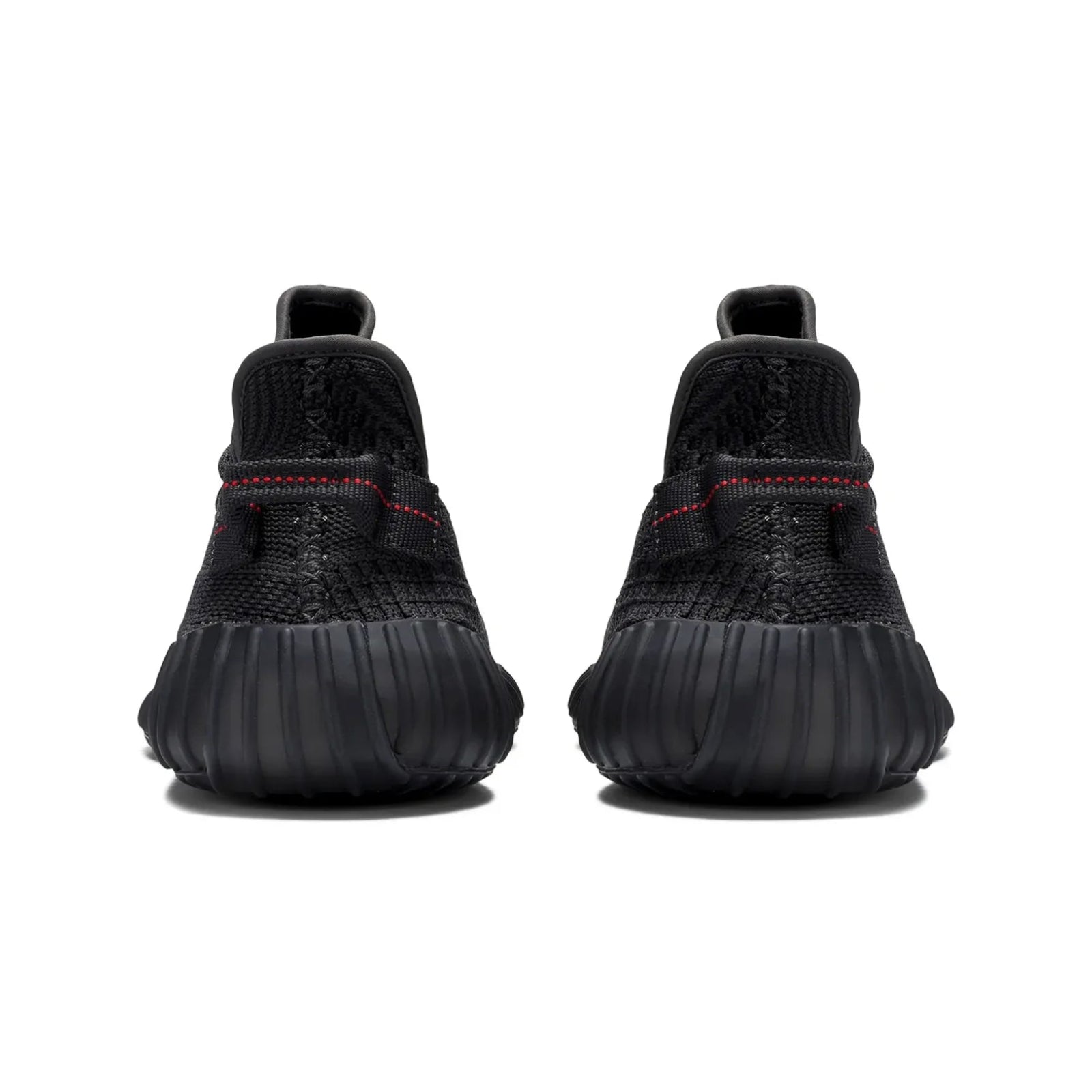 Black athletic shoes with textured design on a white background