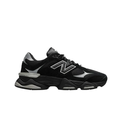 Black sneaker with a brand logo on a white background