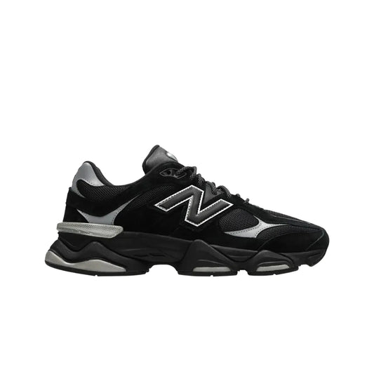 Black sneaker with a brand logo on a white background