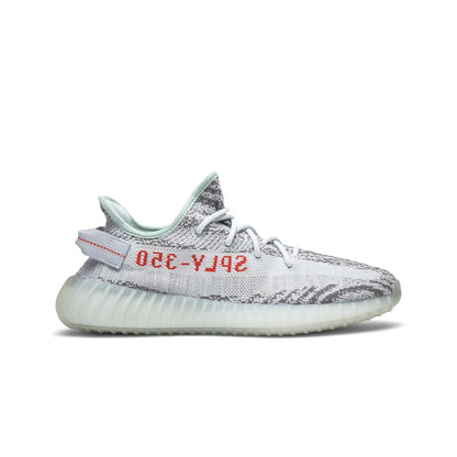 White sneaker with red text on a white background