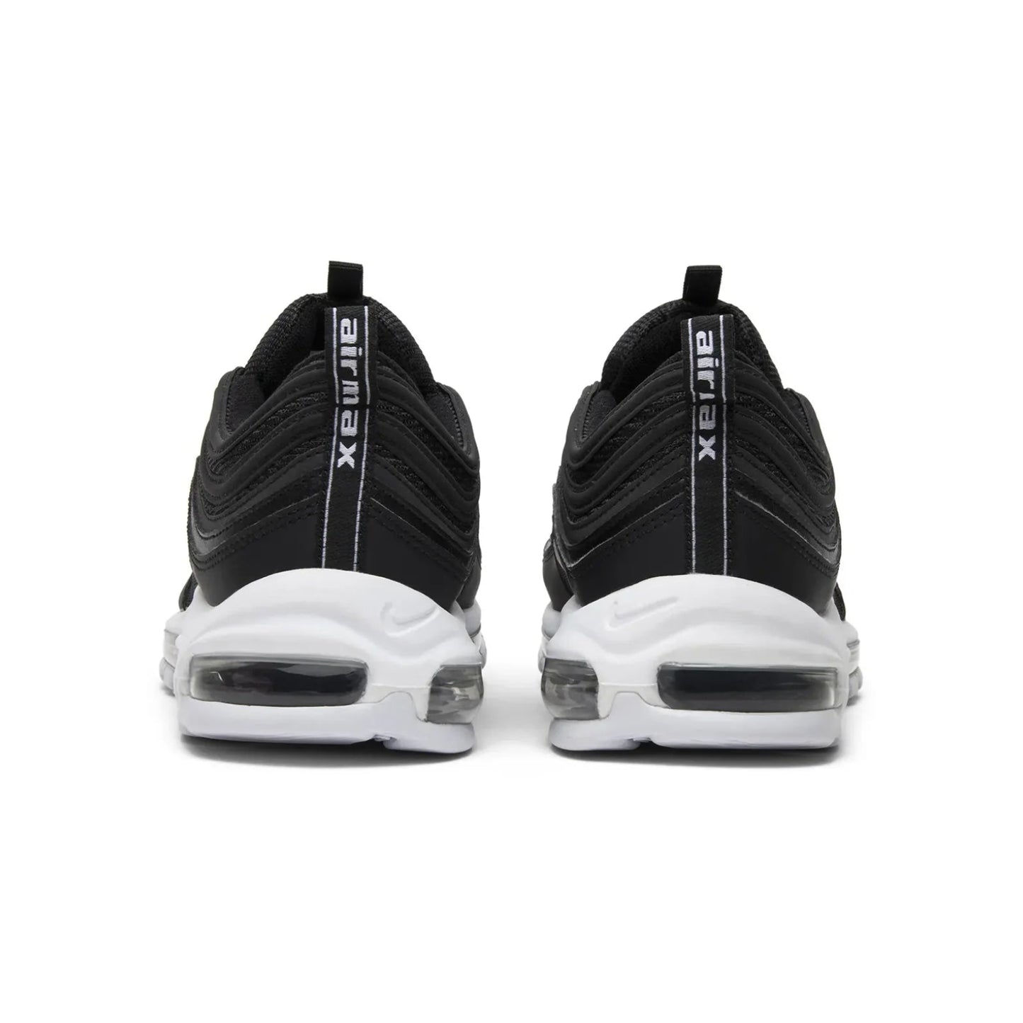 Black and white sneakers with 'Air Max' branding on a white background