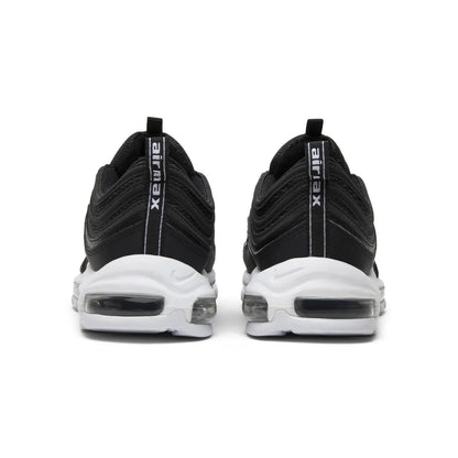 Black and white sneakers with 'Air Max' branding on a white background