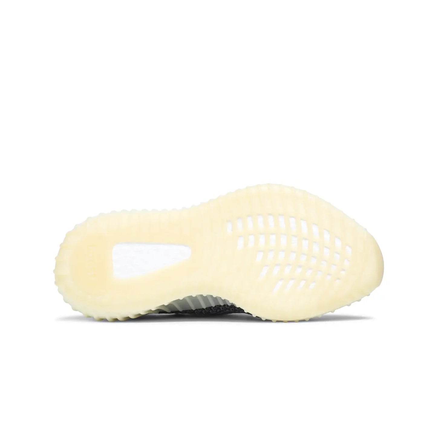 Sneaker with textured sole on a white background