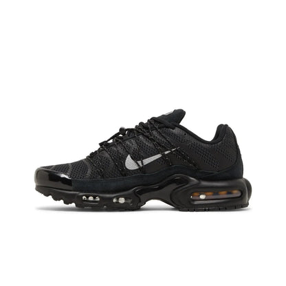 Black sneaker with visible Nike logo on a white background