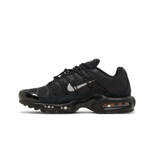 Black sneaker with visible Nike logo on a white background