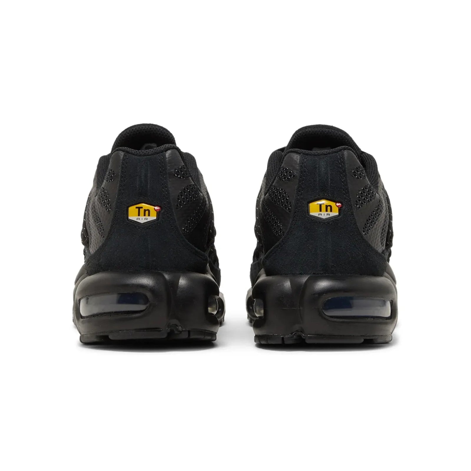 Black sneakers with a visible brand logo on a white background