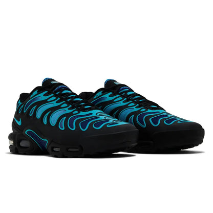 Black and blue sneakers with flame-like pattern on a white background