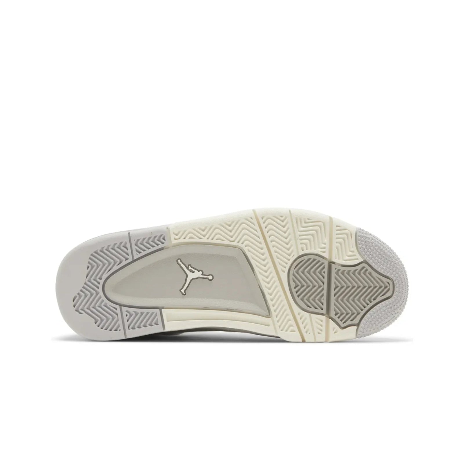 Close-up of a sneaker's sole with a logo on a white background