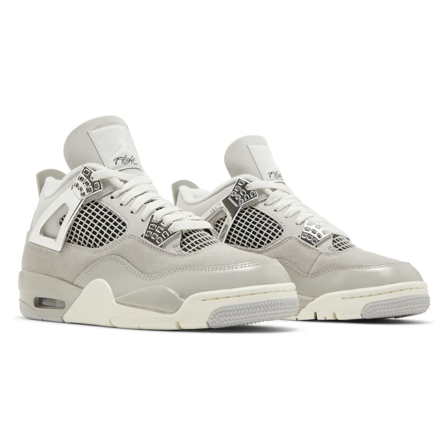 Pair of light gray sneakers with white accents on a white background