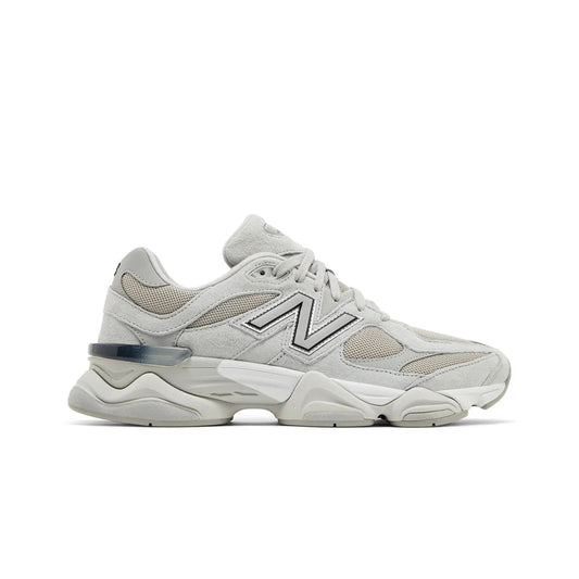 White sneaker with New Balance logo on a white background