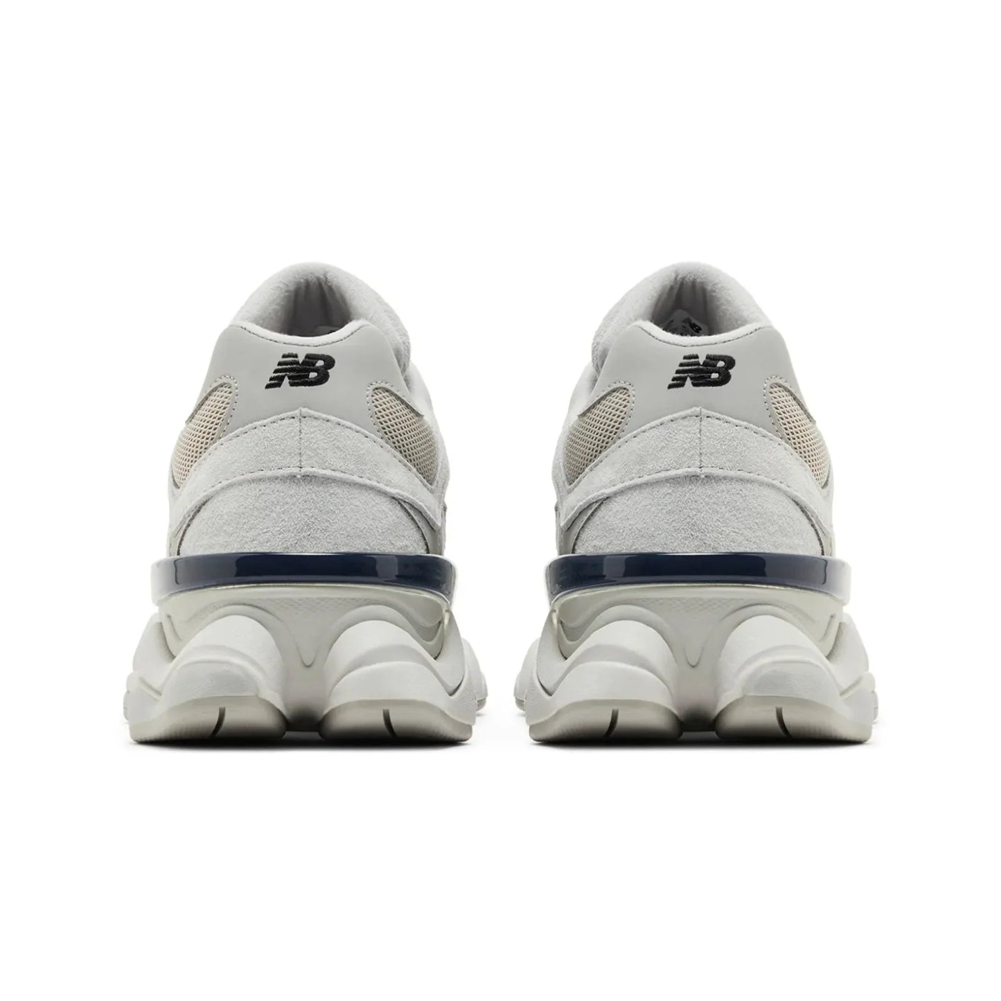 White New Balance sneakers with blue accents on a white background