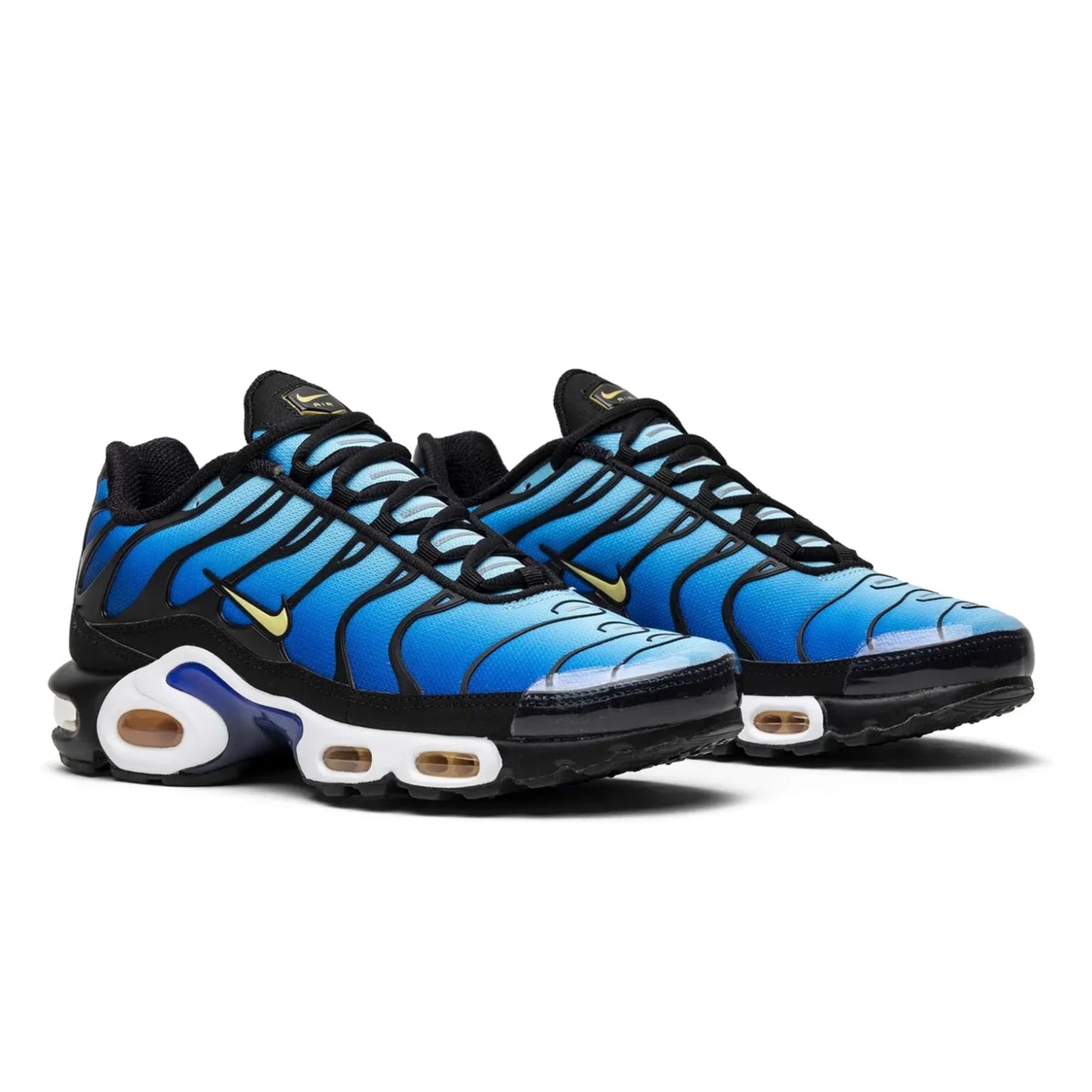 Blue and black Nike sneakers with a white background