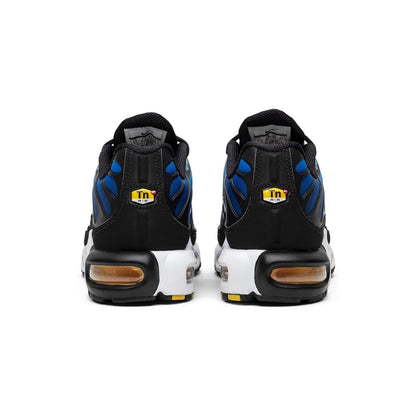 Black and blue sneakers with a visible brand logo on a white background