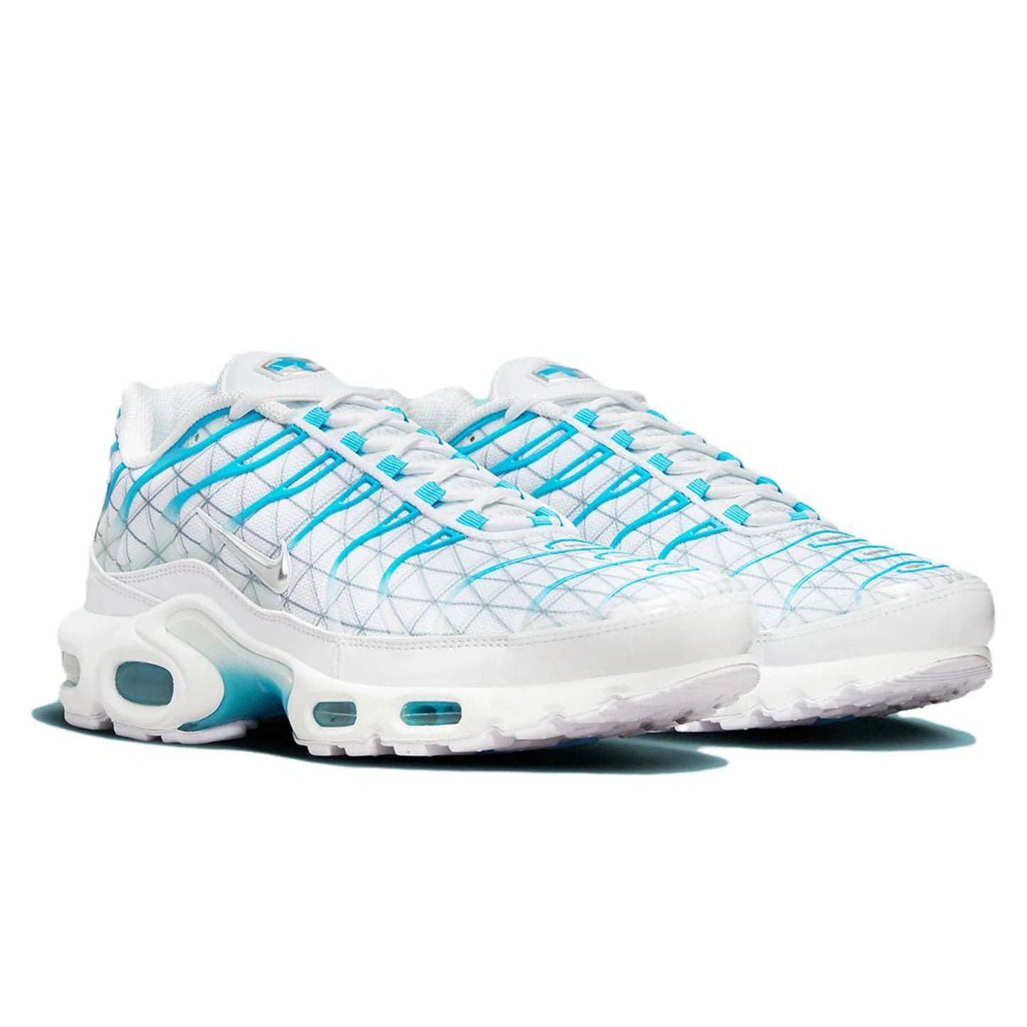 White sneakers with blue accents on a white background