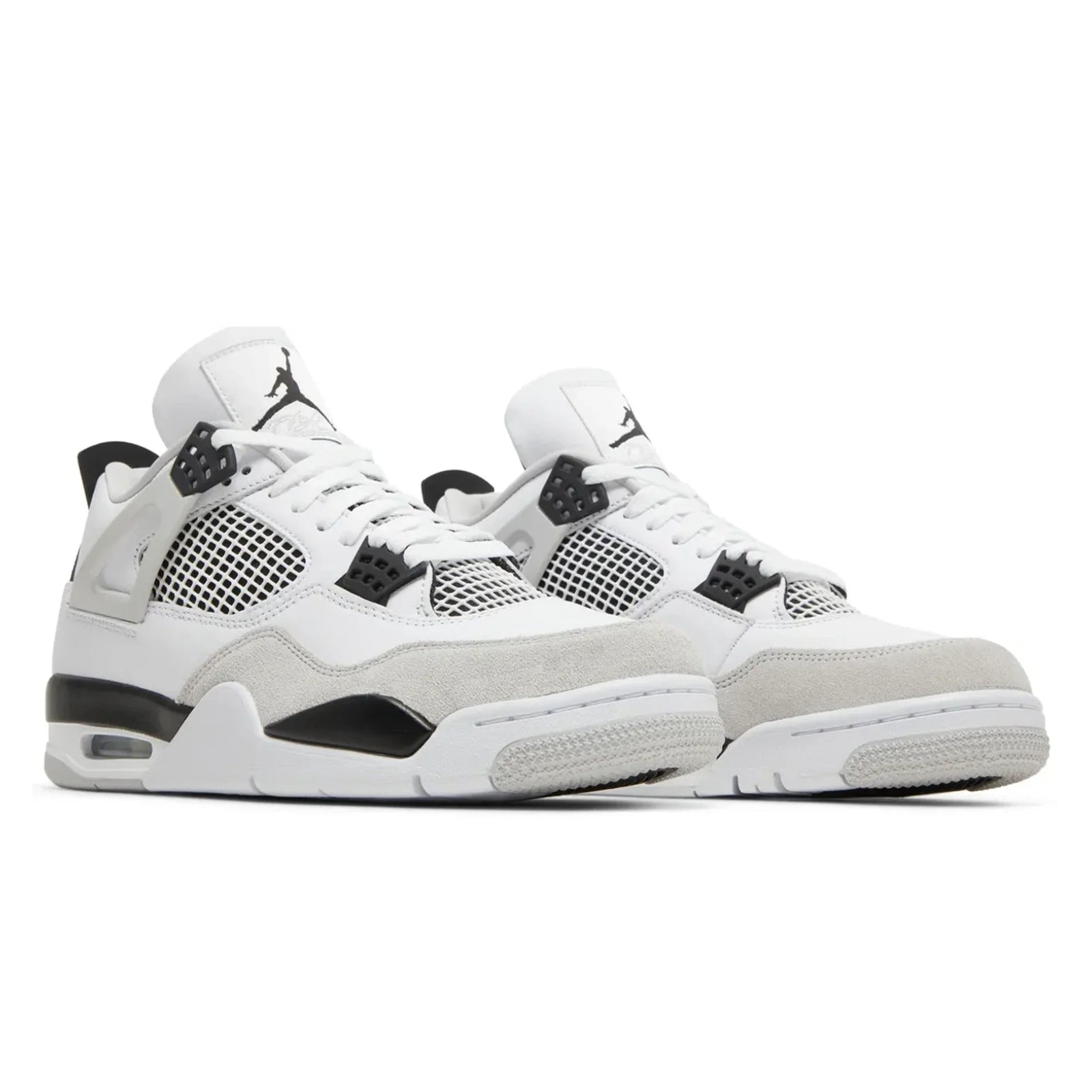 White sneakers with black accents on a white background