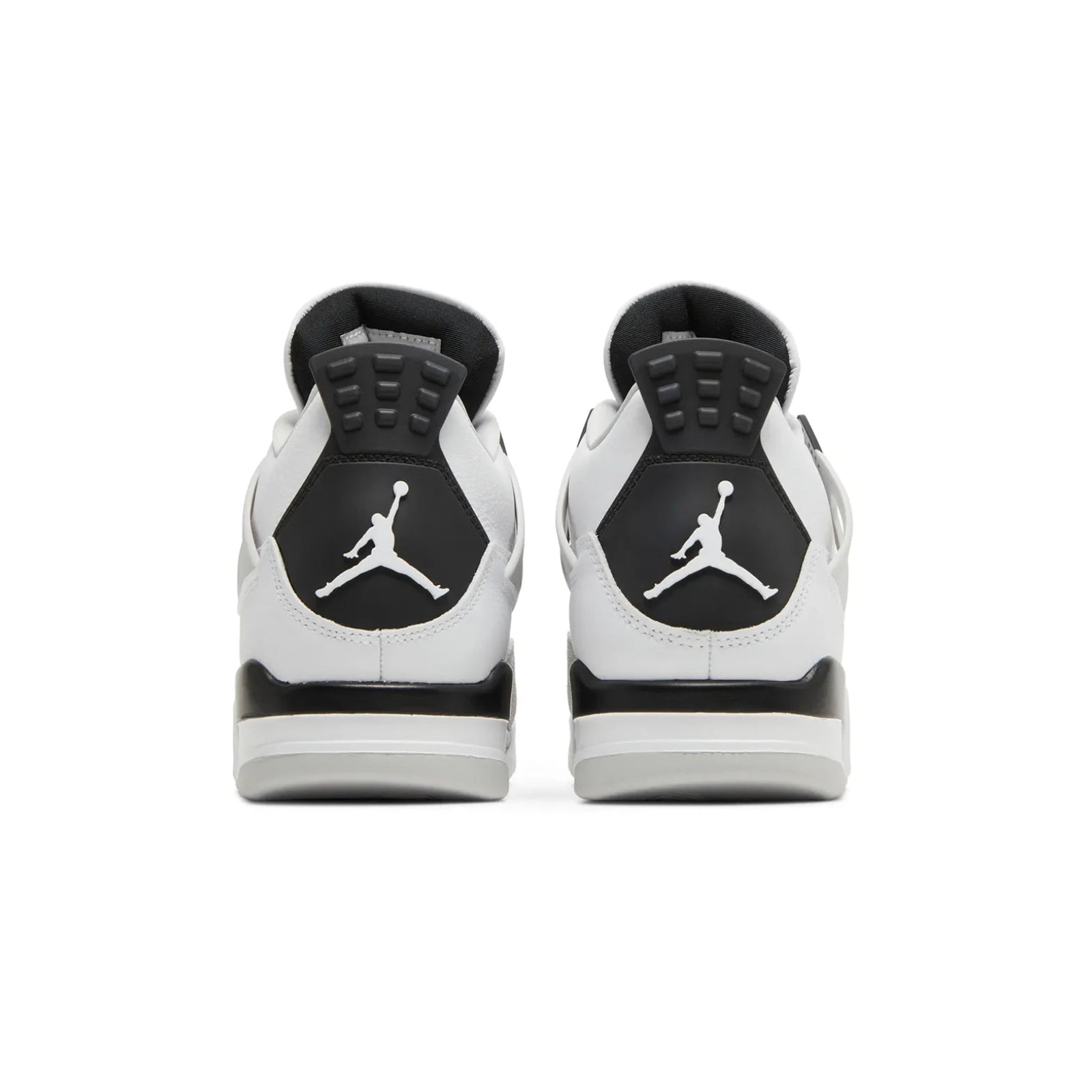 Pair of black and white sneakers with a logo on a white background