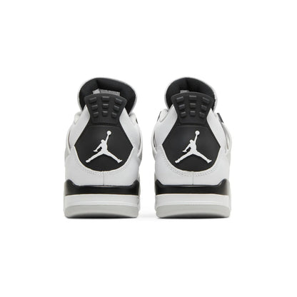 Pair of black and white sneakers with a logo on a white background