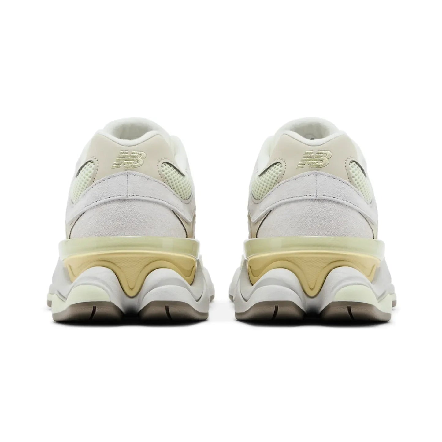 White sneakers with beige soles on a white background