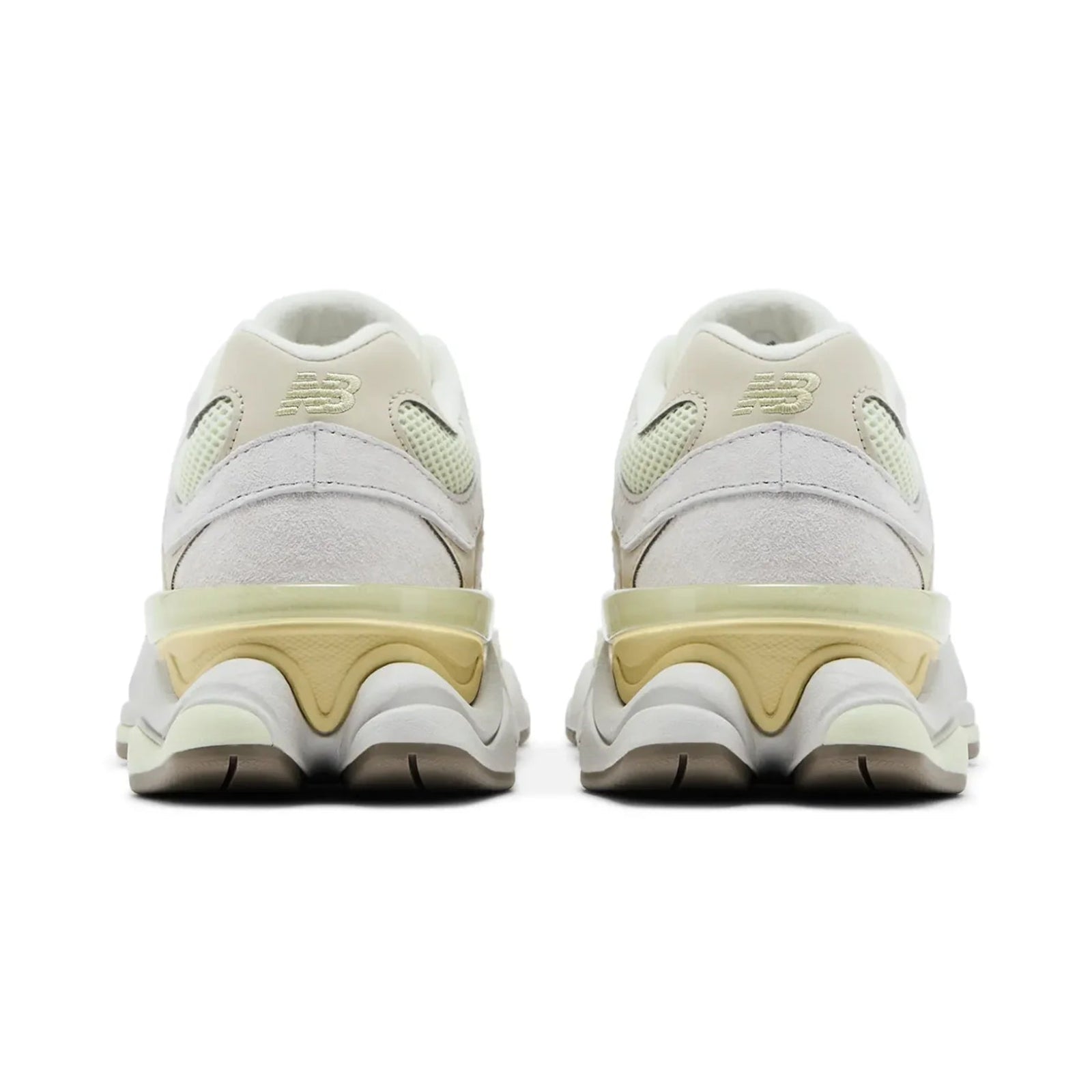 White sneakers with beige soles on a white background