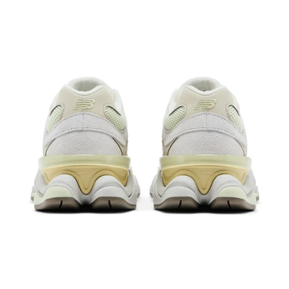 White sneakers with beige soles on a white background