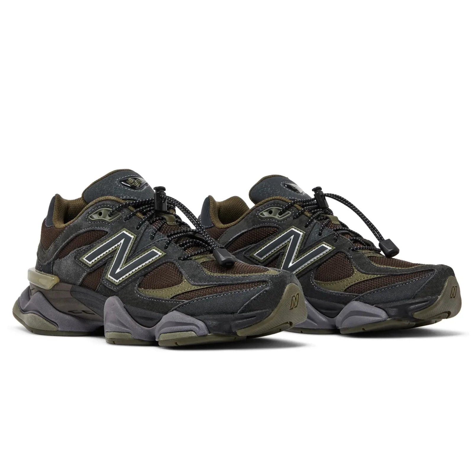 Pair of brown and gray sneakers with New Balance logo on a white background
