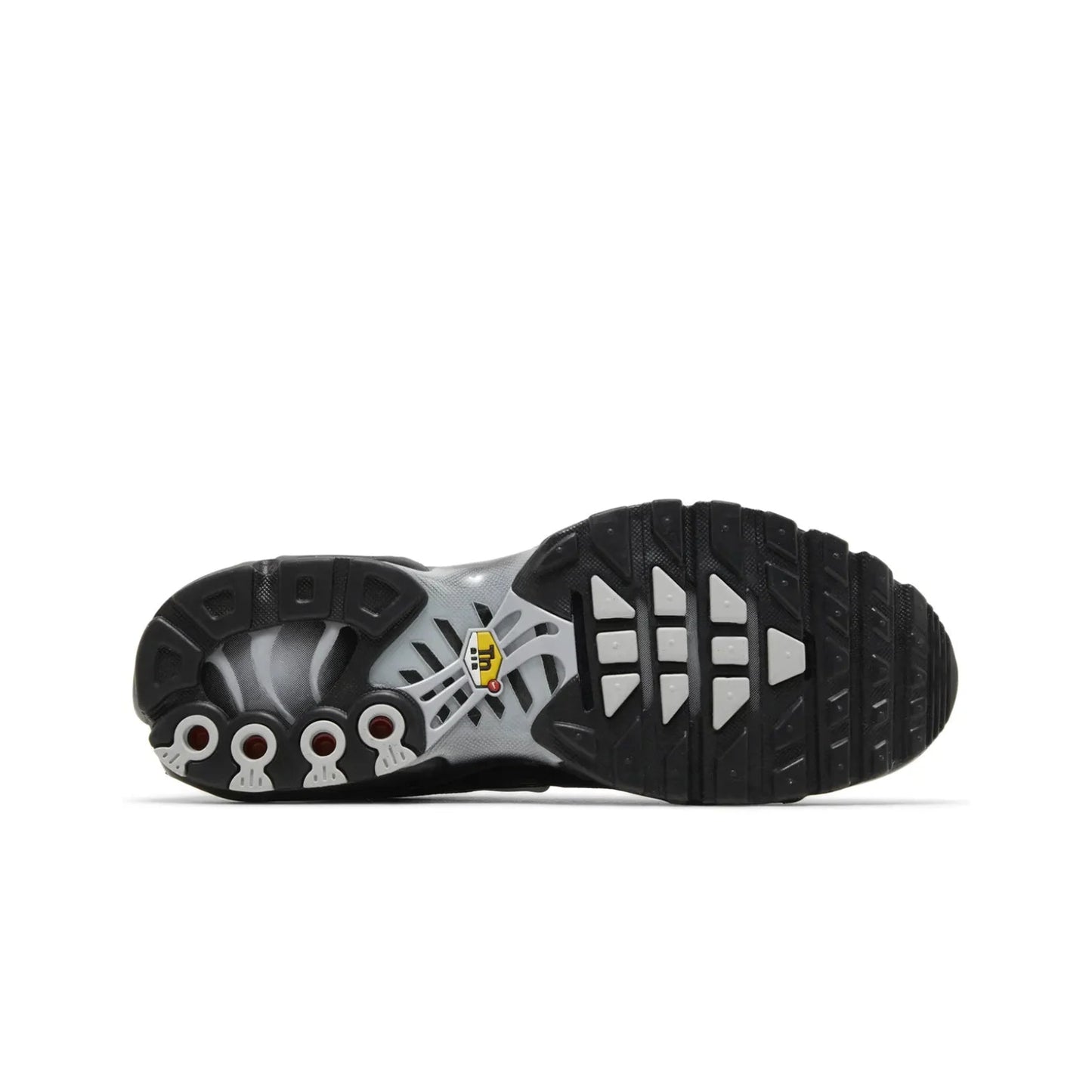 Close-up of a black and gray shoe sole with brand logo on a white background