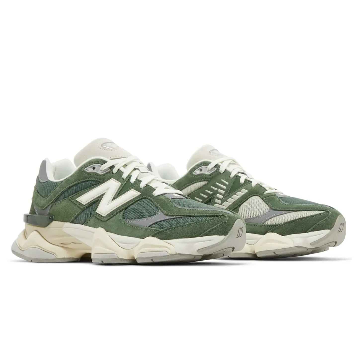 Green and beige sneakers on a white background