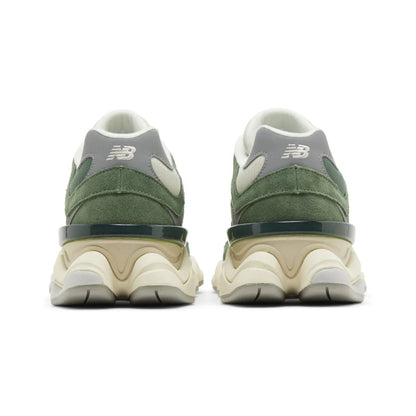 Green and gray sneakers shown from the back on a white background
