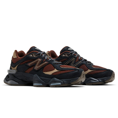 Pair of black and brown sneakers on a white background