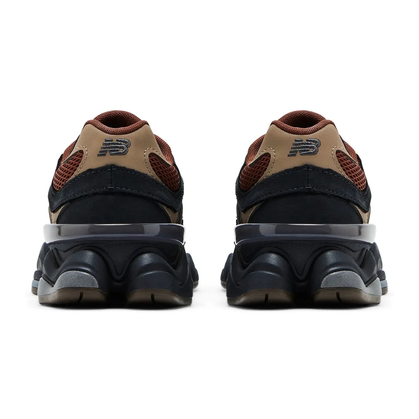 Back view of a pair of brown and black sneakers on a white background