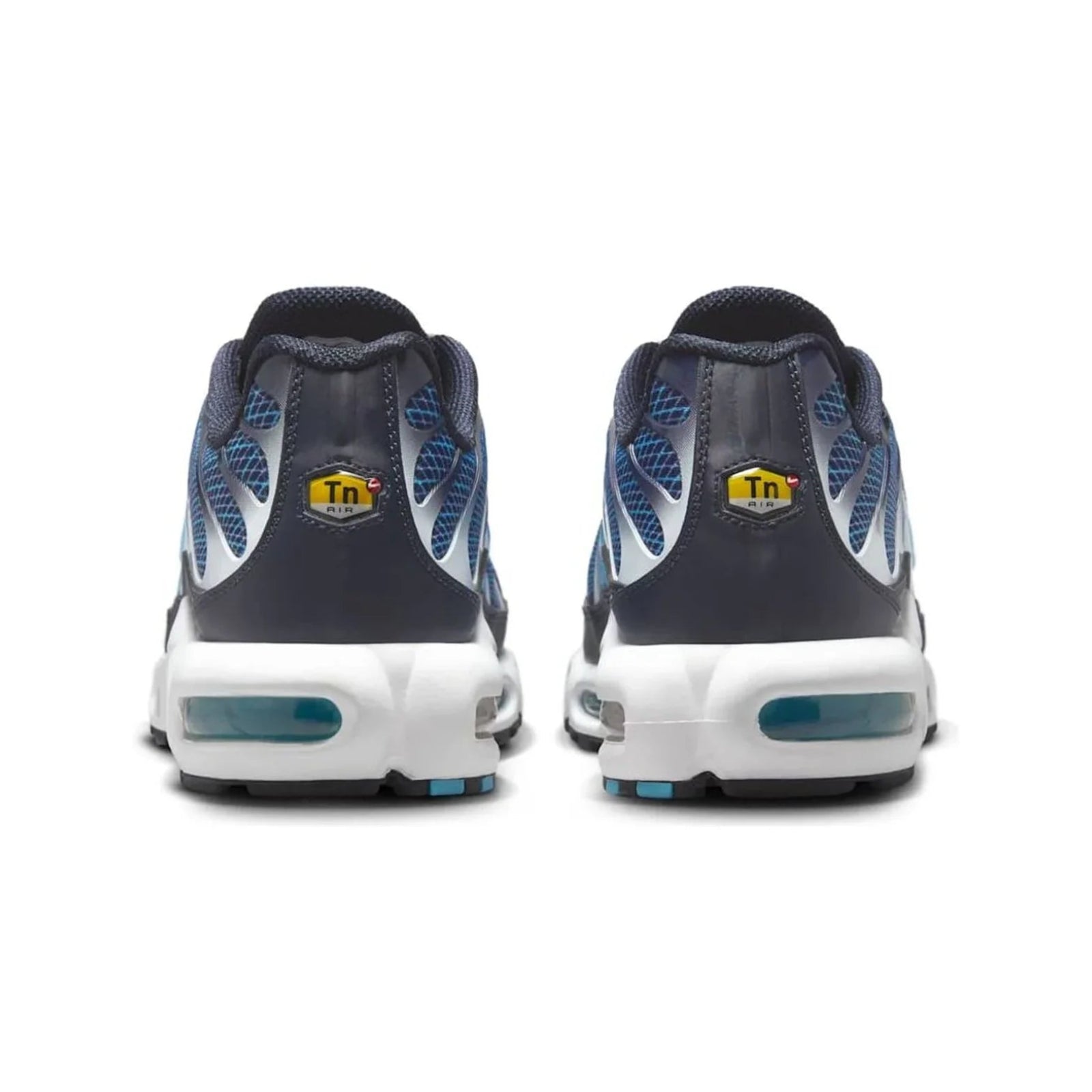 Pair of dark gray and blue sneakers with a visible brand logo on a white background