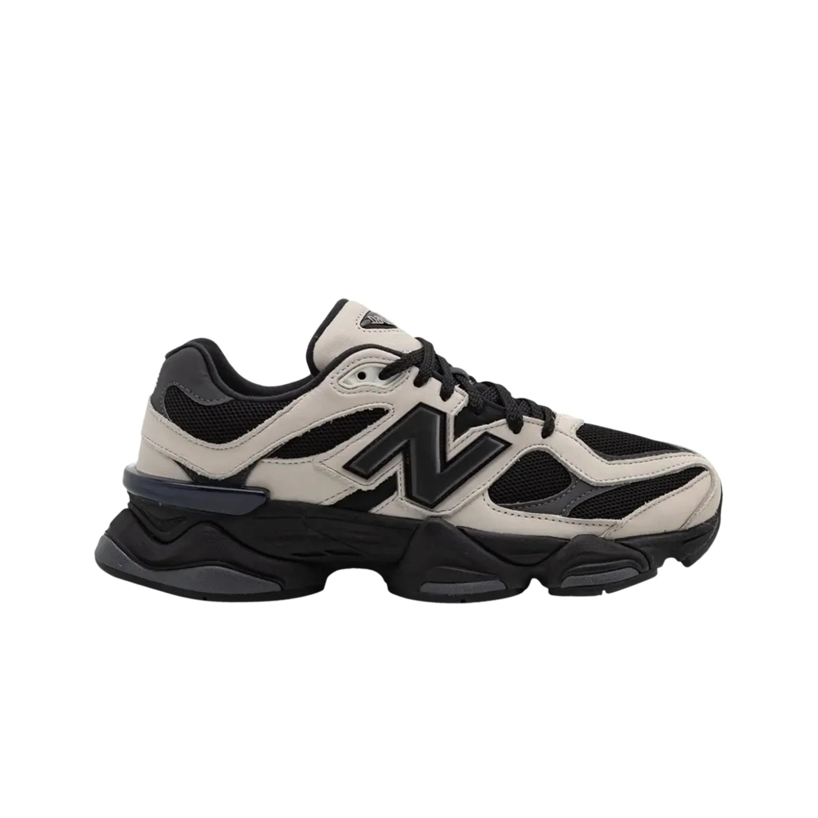 Beige and black sneaker on a white background