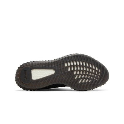 Black sneaker sole on a white background