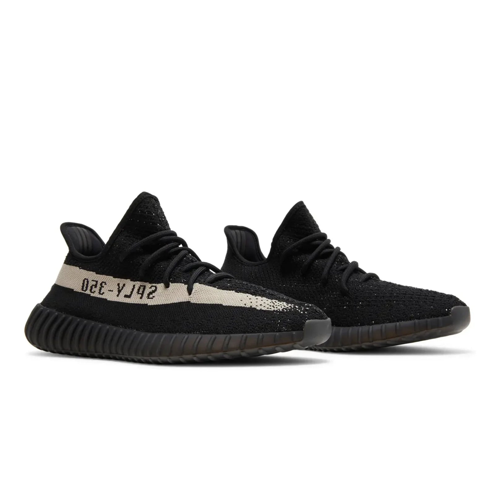 Black sneakers with a visible brand logo on a white background