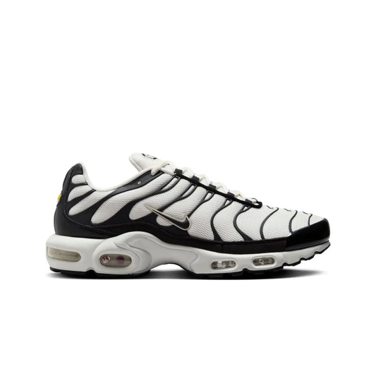 Black and white sneaker with zebra pattern on a white background