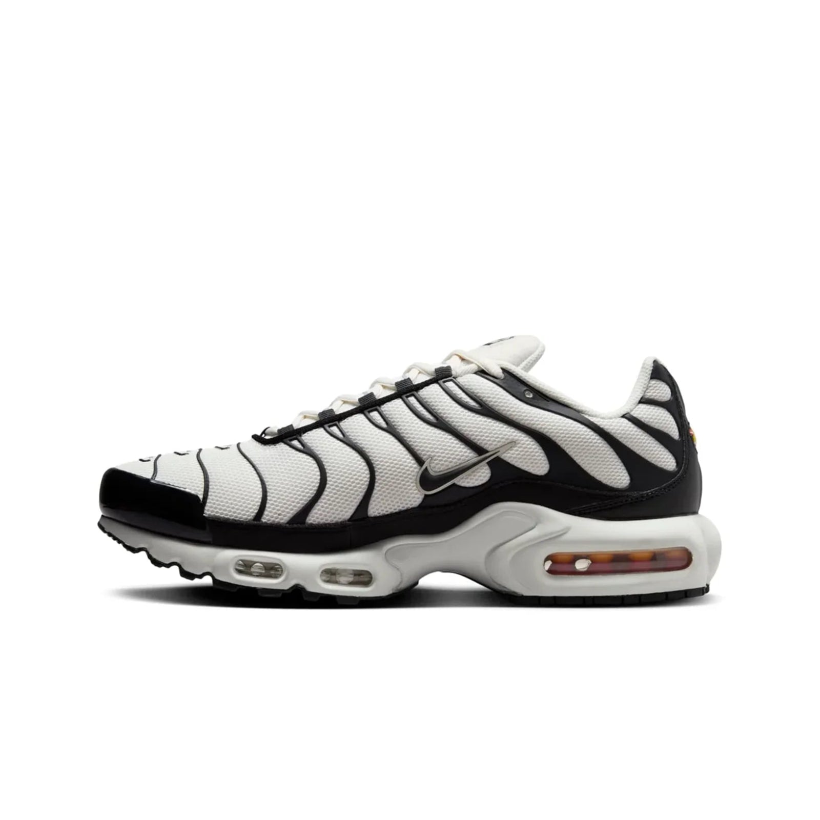 Black and white sneaker with zebra pattern on a white background